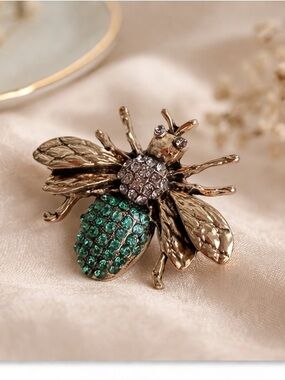 Gold Bee Brooch with Green Crystal Accents